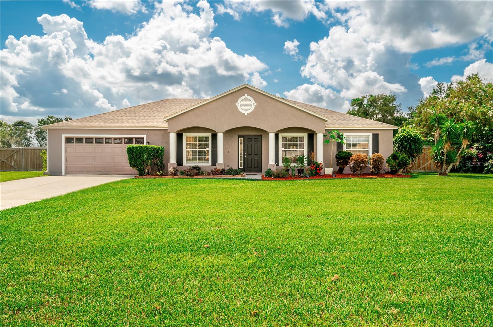 "Bring your boat, RV, and all your toys! This updated 4BR/2BA Plant City home sits on 1.5 acres with a double-gated entry, over 2,700 sq ft, and stunning upgrades throughout." Perfect — I’ll work that into the description so buyers with boats, RVs, or trailers see the value immediately. Here’s your **updated full MLS preview** with the double-gated entry featured: --- – Modern Comfort Meets Country Charm on 1.5 Acres!** Discover this beautifully updated **4-bedroom, 2-bath home** with **over 2,700 sq ft** of living space, perfectly set on **1.5 acres of landscaped beauty** in the sought-after Windmill Pointe community. A **double-gated entry** provides easy access and secure parking for **large vessels, RVs, or trailers**, making this property ideal for those who love the outdoors and need space for all their toys. Step inside to a bright, airy layout with **high ceilings** and a thoughtful split floor plan—placing the **private primary suite** on one side of the home for maximum peace and comfort. The **primary bathroom** offers generous space and a relaxing retreat, while three additional bedrooms (including a converted bonus room with a new closet) provide flexibility for family, guests, or a home office. The **gourmet kitchen** features **granite countertops**, plentiful cabinetry, and a **cozy eat-in breakfast area** with bar seating. A **formal dining room** offers a separate space for special meals, while the living area’s **faux fireplace** adds a warm, decorative touch. Upgrades include: * **Vinyl plank flooring** & plush carpet * **Fresh interior & exterior paint** * **Closed-in patio with air conditioning**—perfect for a year-round sunroom, gym, or lounge * Laundry room** with storage * **2-car garage** with extended driveway * **Well-manicured landscaping** and mature shade trees Enjoy the Florida lifestyle in your **private backyard oasis**, ideal for outdoor entertaining, gardening, or simply relaxing in peace. The 1.5-acre lot offers plenty of room for expansion, recreation, or hobby projects. Conveniently located near major highways, shopping, and dining—yet tucked away in a quiet, established neighborhood—this home delivers the perfect blend of **country tranquility and modern convenience**.