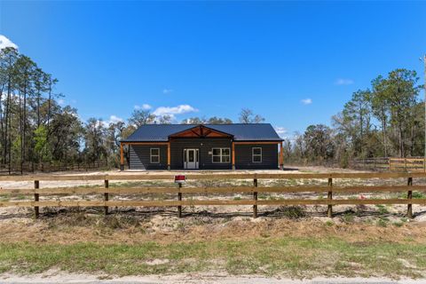 Photo of 3020 SW Westwater Drive, Dunnellon, FL 34431 (MLS # W7883647)