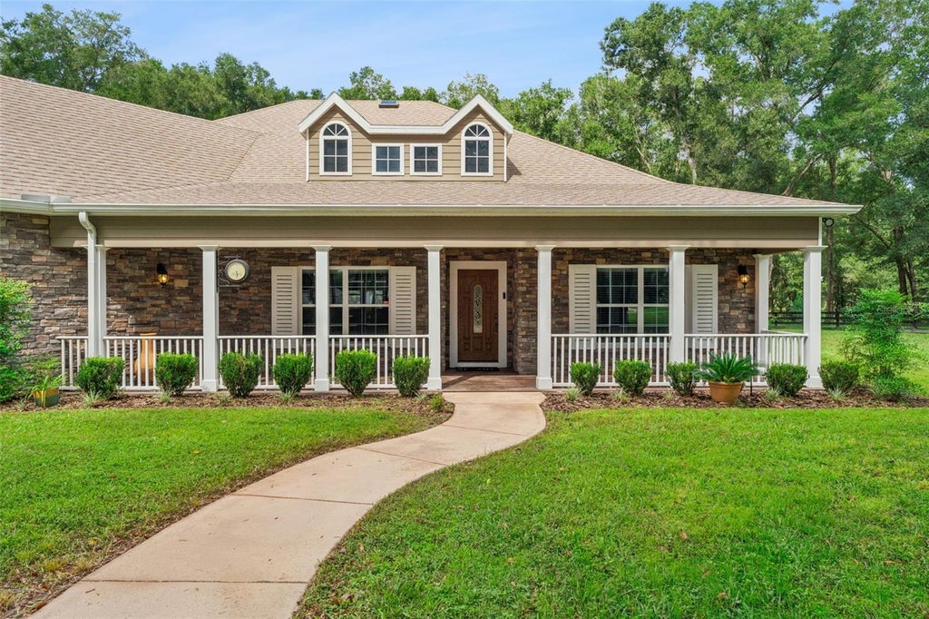 Photo of 35629 Seneca Reserve Drive, Eustis, FL 32736 (MLS # O6442977)