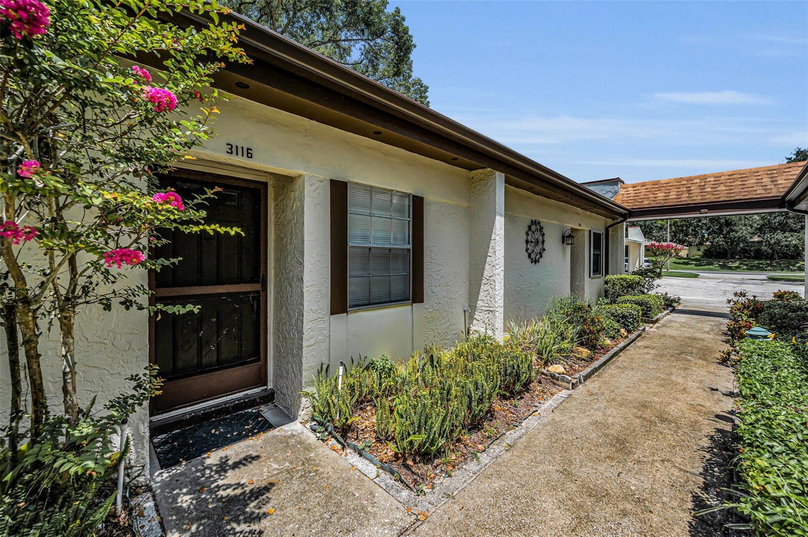 Beautiful Villa in Desirable Mission Grove Highland Lakes in Palm Harbor! Live the Florida Dream in this 55 plus Community! Features Furnished 1 Bedroom 1 Bath Villa. Updated Kitchen with Pass thru Window and Dining Room Living Room Combination. Inside Closet with Washer/Dryer Combo Unit. Spacious Bedroom and Bonus Enclosed Lanai that leads out to Garden Patio Area. One Car Carport and plenty of Guest Parking! Short Walk to Pool and Beautiful Lake Area! Low HOA Fee includes Pool, Water, Sewer, Trash, Exterior Maintenance, Roof, Cable and Internet! Highland Lakes Community Offers membership to access to Golf Courses and so much more! Minutes from Shopping, Restaurants, Beaches and Trader Joe's Grocery Store! Quick Commute to Tampa and Airports! Call Today for your Private Showing!