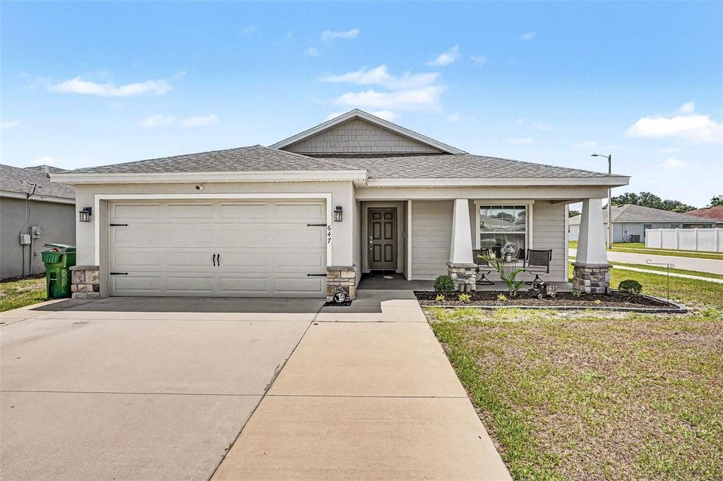 Photo of 647 Lorient Drive, Eagle Lake, FL 33839 (MLS # TB8512817)