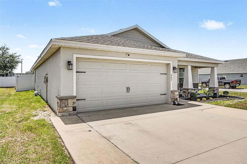 Photo of 647 Lorient Drive, Eagle Lake, FL 33839 (MLS # TB8512817)