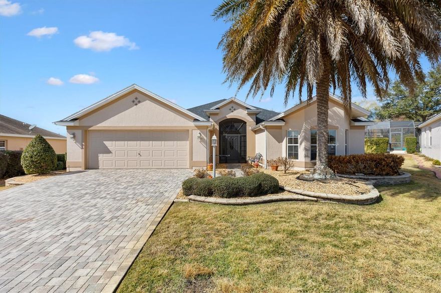 Lovely 3/2 Lantana Designer Home in the Village of Bonita. MINUTES TO SUMTER LANDING BY GOLFCART. ROOF 2023, HVAC 2024. Oversized Cul-de-Sac lot with room for a pool. This furnished home welcomes you with a paver driveway and front walkway, mature landscaping, and a screened front porch accented by a stained-glass front door with stained glass side panels and transom window. Inside, enjoy an open and split floor plan with Ceramic Tile and Engineered Hardwood flooring throughout, enhanced by crown molding, window cornices, and custom closets. The eat-in kitchen features newer dark stainless steel appliances, granite countertops, pantry, pull-out cabinet shelves, and a solar tube. The adjacent laundry room offers additional pantry cabinets for all your storage needs. The primary suite includes a large walk-in closet and ensuite bath with split vanities and make up desk, newer (2022) Roman walk-in shower with bench, water closet, solar tube.
Two guest bedrooms share a guest bath with a tub-shower combo, while the front bedroom delights with bay windows. 
The living room and kitchen dinette open to an enclosed, temperature-controlled lanai equipped with ceiling fans and pull-down solar shades, perfect for year-round enjoyment. An adjacent outdoor patio is ideal for grilling, making this home a true haven for relaxation and entertainment. Plus, it comes furnished for your convenience! Golf Cart is being sold separately. This home is surrounded by Bacall, Kenya and Hemmingway Executive golf Courses. Colony Cottage Recreation Center and shopping is just minutes away and you will be centrally located between Sumter Landing and Brownwood town centers for dining and entertainment. Call today to schedule your private showing and start living The Villages dream.