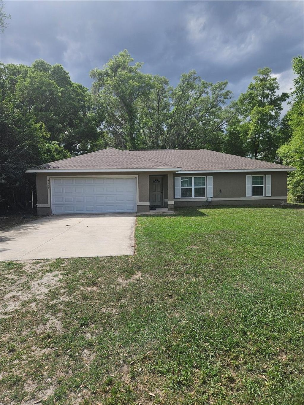 Photo of 14196 SE 34th Terrace, Summerfield, FL 34491 (MLS # O6396848)