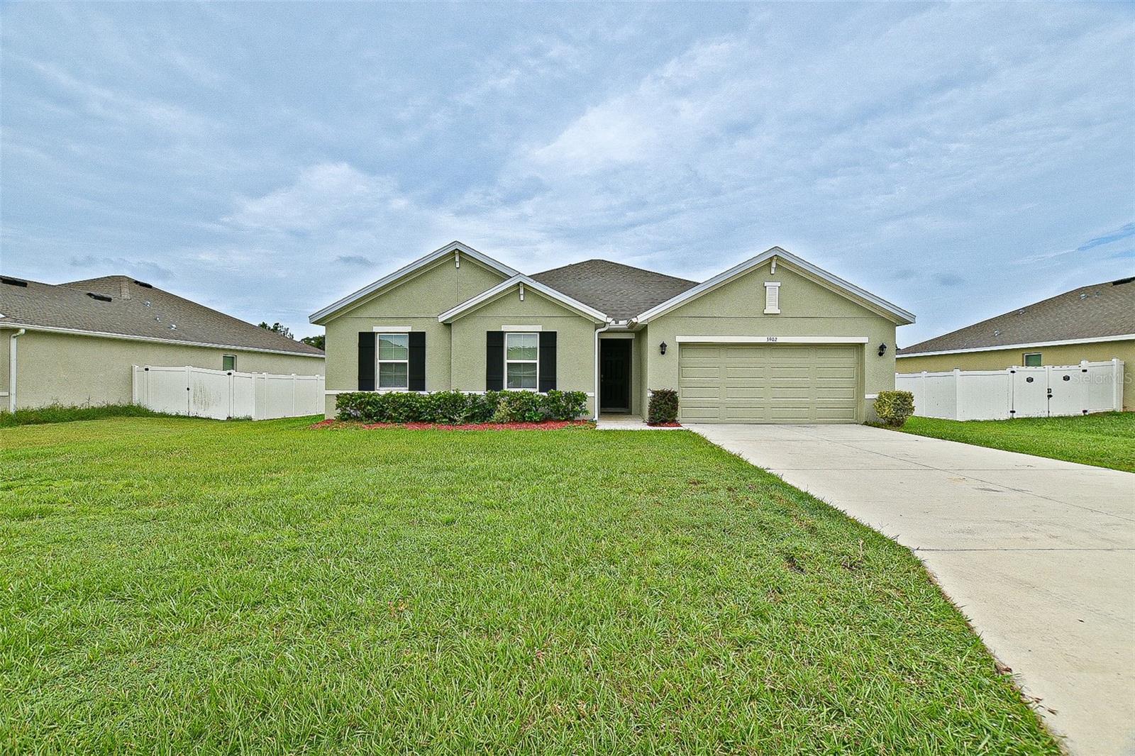 Newer home that is move in ready in the popular community of Cobblestone North. Cairn-R model. Aff fenced back yard, 4 bedrooms and 2 baths. The primary bedroom has two closets. Covered patio. Cobblestone North is very close to 441 quick access to The Villages or Ocala areas. Great all age community of newer homes.