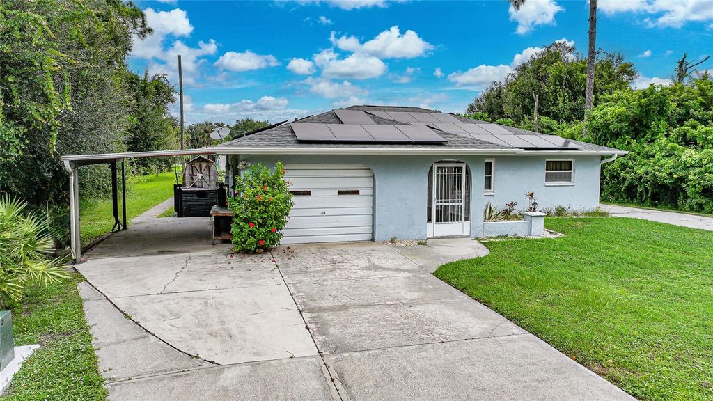 Photo of 1074 Darby Drive NW, Port Charlotte, FL 33948 (MLS # C7514402)