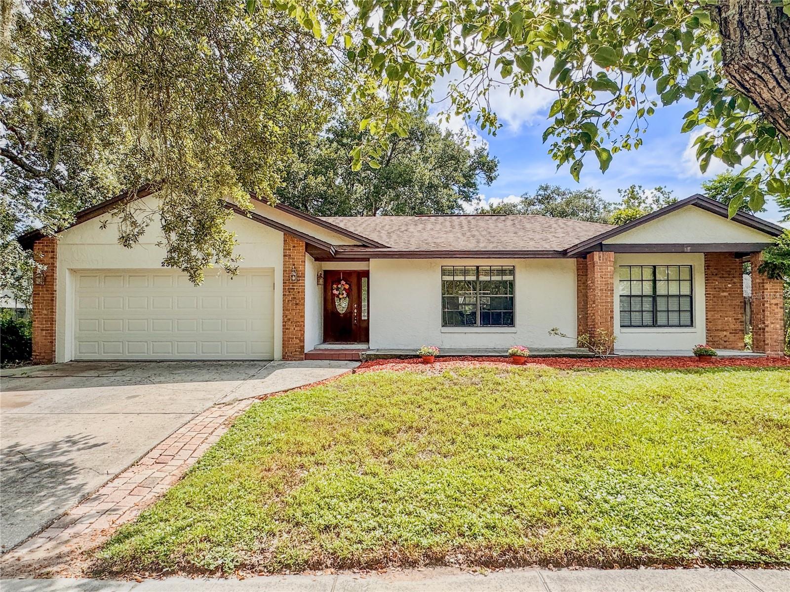 Spectacular Oviedo Pool Home – 2507 Creekview Cir
4 Beds • 2 Baths • Spacious .25-acre Lot
Step into this impeccably updated Oviedo gem, where modern elegance meets inviting warmth. The foyer welcomes you into a formal living and dining area, perfect for entertaining, leading into a beautifully refreshed kitchen. It boasts 42” white cabinetry, granite countertops, and premium stainless-steel appliances. Natural light abounds, shining through a skylight and showcasing views of the sparkling, screened pool and lush backyard.
The kitchen flows effortlessly into the sunny dining area and adjacent great room, featuring soaring vaulted ceilings, another skylight, and a cozy wood-burning fireplace, ideal for chilly Florida evenings. French doors connect the great room to a screened-in pool and extended uncovered patio. The pool’s rare 8-foot depth makes it a standout; the spacious patio invites recreation, from mini-basketball games to large-scale entertaining. With a fully fenced yard on over a quarter-acre, there’s room for play, pets, or peaceful gatherings.
The home’s split floor plan offers privacy and modern convenience. The sizable master suite features a luxurious all-tile bathroom with granite countertops, a double-sink vanity, large tiled shower, elegant flooring, and his-and-hers closets. The three additional bedrooms, outfitted with comfortable carpeting, are served by the second updated bath, also featuring granite countertops and modern finishes.
Key updates include a roof replaced in 2015 and a newer A/C system installed just three years ago ensuring peace of mind for years to come.
Community & Location Highlights: Nestled in highly sought-after Oviedo, this home enjoys access to top-rated Seminole County schools, nearby Trinity Prep, and is just minutes from Winter Park, Rollins College, UCF, VCC, Full Sail, Downtown, and major highways (417, 429, I-4, 408).
Oviedo blends small-town charm with modern amenities. Picture charming local events like “Taste of Oviedo,” the vibrant Oviedo on the Park with its amphitheater and lakeside gatherings, and regular Farmers Markets—all fostering real community spirit. The area is a paradise for nature lovers, with parks like Center Lake Park offering splash pads, dog-friendly spaces, and walking trails, as well as natural escapes like Little Big Econ State Forest and airboat adventures at Black Hammock on Lake Jesup.