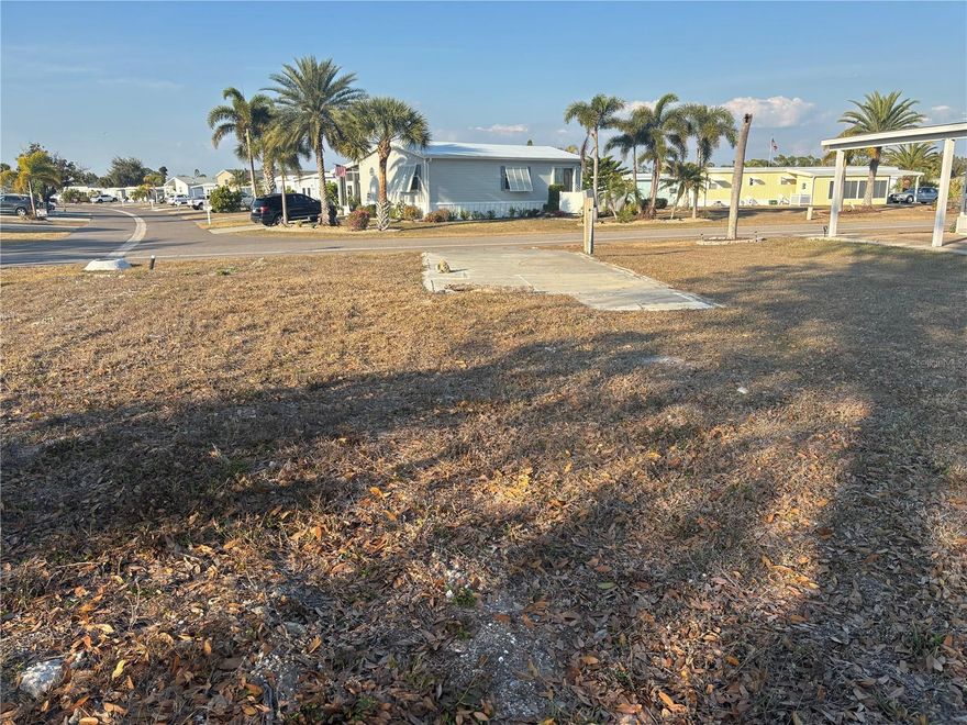 Build your dream retreat on this spacious 60 x 101 vacant lot, perfectly positioned in a lively Gulf-access waterfront community designed for fun, relaxation, and connection. With plenty of room for your manufactured home, outdoor living space, parking, and landscaping, this generously sized parcel offers the flexibility to create a seasonal getaway or full-time residence tailored to your lifestyle and budget.

Located in a vibrant, welcoming neighborhood where neighbors quickly become friends, you’ll enjoy an active social calendar filled with events, clubs, and recreational activities throughout the season. Whether you prefer staying active or simply soaking up the sunshine, there’s something here for everyone.

This amenity-rich community features:

Two sparkling pools

Fishing pier

Boat ramp with 25+ boat slips

Beautiful pool area with BBQ section

Large recreation hall with full kitchen

Craft room and laundry facilities

Dedicated areas for woodworking, pickleball, shuffleboard, and more

Golf cart-friendly streets

Outdoor enthusiasts will love the easy access to boating and fishing right from the community docks, as well as several nearby Gulf beaches. Golf lovers can take advantage of multiple premier golf courses within five miles. And when it’s time to dine out, you’ll find fantastic local waterfront restaurants just minutes away.

Imagine peaceful mornings on your porch, sunny afternoons enjoying the amenities, and evenings filled with laughter and community gatherings. Whether you’re seeking a winter escape, rental investment opportunity, or year-round residence, this lot offers the perfect opportunity to own your own slice of paradise.

Start building not just a home — but the lifestyle you’ve been dreaming about.