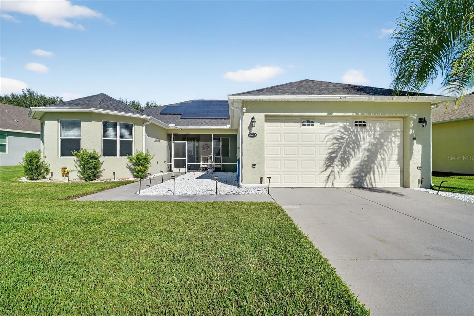 *** THIS HOME HAS EVERYTHING*** Come out to this 55+ community to see this beautifully maintained 2-bedroom, 2-bath + OFFICE/DEN home located in Leesburg, FL. This peaceful home has been UPDATED throughout, featuring PAID OFF solar panels (NO ELECTRIC BILL), brand new 4-ton AC Unit (2025), newer shingle/asphalt shingle roof (2024), well manicured landscaping with metered sprinklers, newer washer and dryer, stove and dishwasher (2024). Other amenities include an osmosis water filter, water softener, home alarm and camera system, and a generator plug-in. Adding character as you step inside the home is a LEADED STAINED GLASS front door, CEILING FANS, TRACK LIGHTING, PLANTATION SHUTTERS, CERAMIC TILE and ENGINEERED HARDWOOD FLOORING throughout. The kitchen area, with TRUE WOOD cabinets, a BREAKFAST NOOK, and FAMILY ROOM are an open concept, inviting family and friends to gather. There is a separate LIVING ROOM that connects with a DINING ROOM, perfect for entertaining. The two LARGE BEDROOMS each have plenty of space with their own BATHROOM, and there is an additional room that can be used as an HOME OFFICE, DEN, or THIRD BEDROOM complete with a MURPHY BED. Enjoy your morning coffee and sunshine in the SCREENED IN FRONT PORCH, or afternoon shade and serenity in the ENCLOSED, SCREENED BACK PORCH. This home is listed as unfurnished, although some furnishings remain for staging purposes. Separate sale of these items is negotiable. The golf cart community boasts with an 18-hole golf course, restaurant & bar, movie theater, resort-style pool and sauna, fitness center, spa/nail salon, library, recreation room with pool tables, clubhouse and walking trails. With a low monthly HOA, MOVE-IN READY HOME, AND LUSH COMMUNITY EXTERIOR, everything you need to enjoy the best living is right here in Central Florida! Schedule your tour TODAY!!