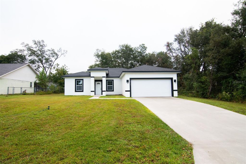 Photo of 12793 SW 43rd Circle, Ocala, FL 34473 (MLS # G5103849)