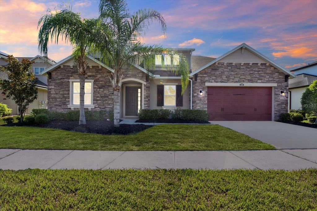 Photo of 2120 Gwynhurst Boulevard, Wesley Chapel, FL 33543 (MLS # TB8401183)