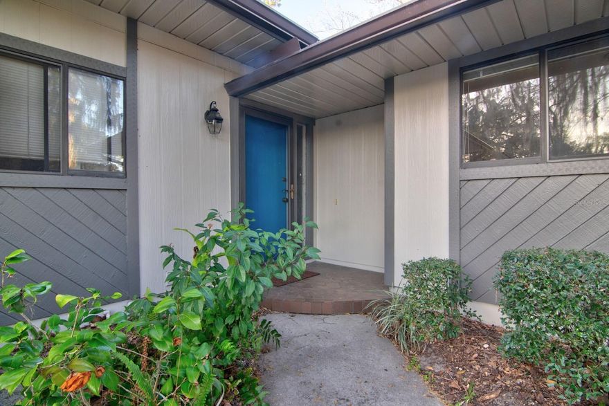 Welcome to Cumberland Circle, where comfort and convenience come together in this beautifully updated 3-bedroom, 2-bathroom single-family attached home. Ideally situated just minutes from the University of Florida and nearby medical facilities, this location offers quick access to everything you need.

Step inside to an inviting living space featuring high vaulted ceilings, a cozy fireplace, and a bright, open layout. The spacious bedrooms provide plenty of room to relax, and the home boasts brand-new flooring with no carpet throughout, offering both style and easy maintenance.

Enjoy the outdoors from the bright covered patio—perfect for morning coffee or unwinding at the end of the day. The community enhances your lifestyle with access to tennis courts, a swimming pool, and a clubhouse, giving you resort-style amenities right at home.

This move-in-ready property combines an excellent location with desirable upgrades—an ideal place to call home.