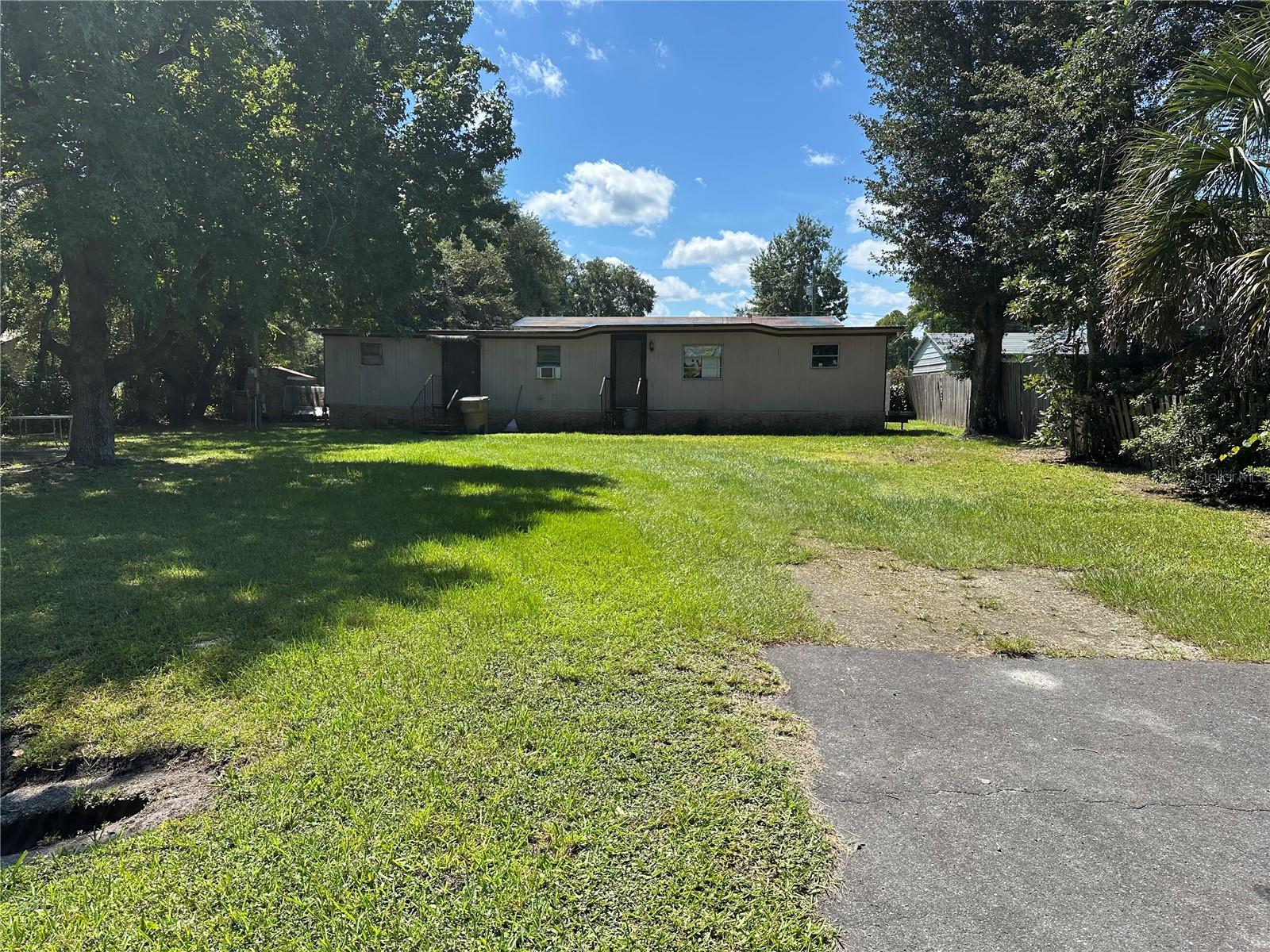 1971 Manufactured Home featuring two bedrooms and two bathrooms. This home is a fixer-upper with some areas of weak flooring, but could be livable while completing renovations. The property already has impact fees paid and utilities in place water, sewage, and electric making it a great opportunity. You can either update this existing structure or demo it and place a brand new manufactured home.
Located in a nice quiet neighborhood within the Astor Forest Campsite for just $40 a year. You’ll have access to the private boat ramp off Blue Creek Road giving you plenty of opportunity to enjoy the St. John’s River lifestyle.