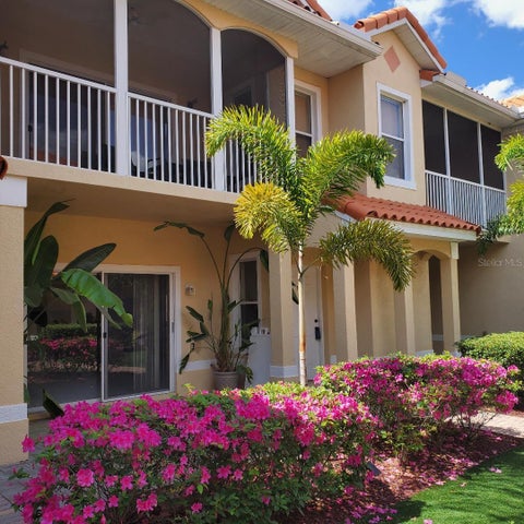 Photo of 21019 Sunpoint Way #102, Lutz, FL 33558 (MLS # TB8547152)