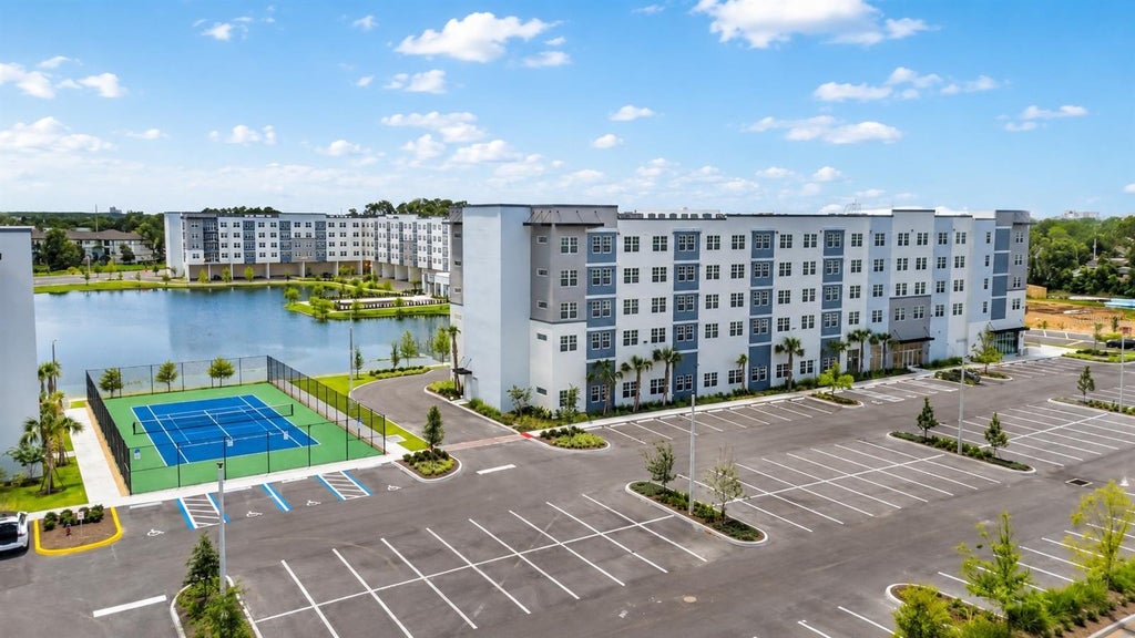 Photo of 5563 Millenia Park Boulevard #301, Orlando, FL 32839 (MLS # S5154322)