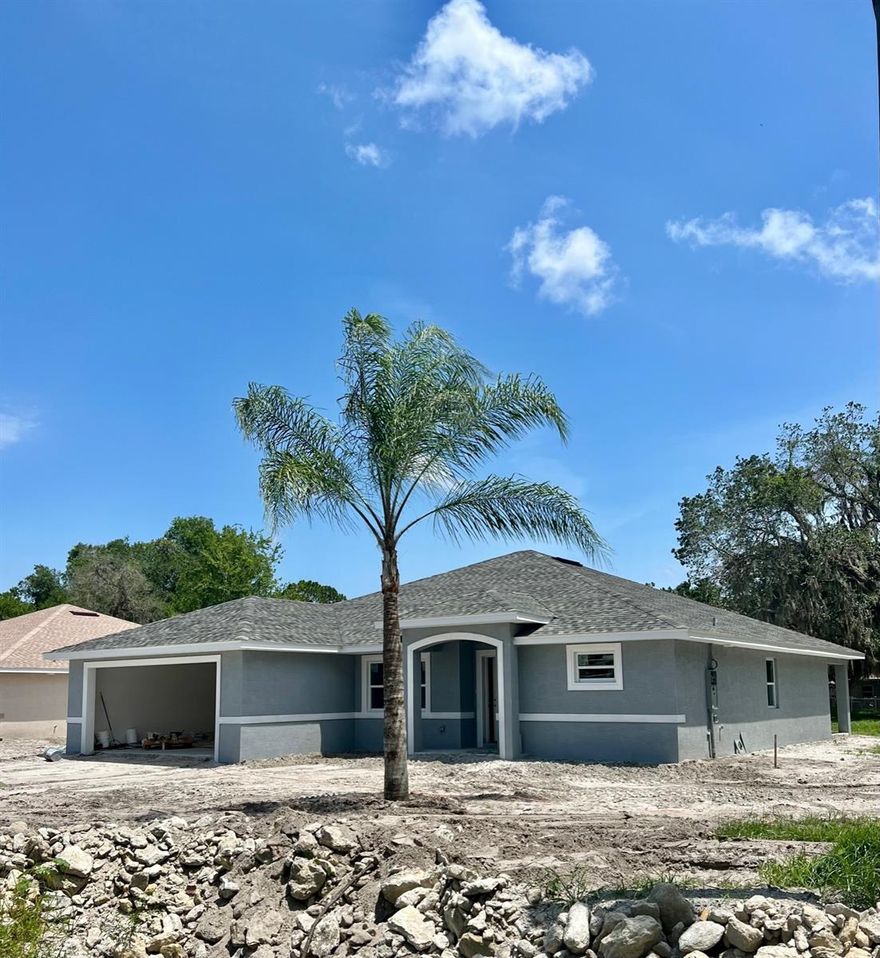 ALMOST DONE but still time for you to put your finishing touches on this BRAND NEW home to make this 3 bedroom 2 bath house your home. This Open floor plan home features a desirable split bedroom floor plan, vaulted ceilings & amazing upgrades which include stainless steel appliances  and quiet close cabinets and from the living room, the sliding glass doors lead to a covered lanai that lends extra living area to make entertaining friends and family fun and easy. Soundly constructed of concrete block, this home is as efficient as it is welcoming. Additional features to the layout include 2 car garage and elegant lighting features and custom tile in the bathrooms.  All this and conveniently located near to schools, parks, &shopping dining. Welcome home to 1105 Walter Street. ;Water: City