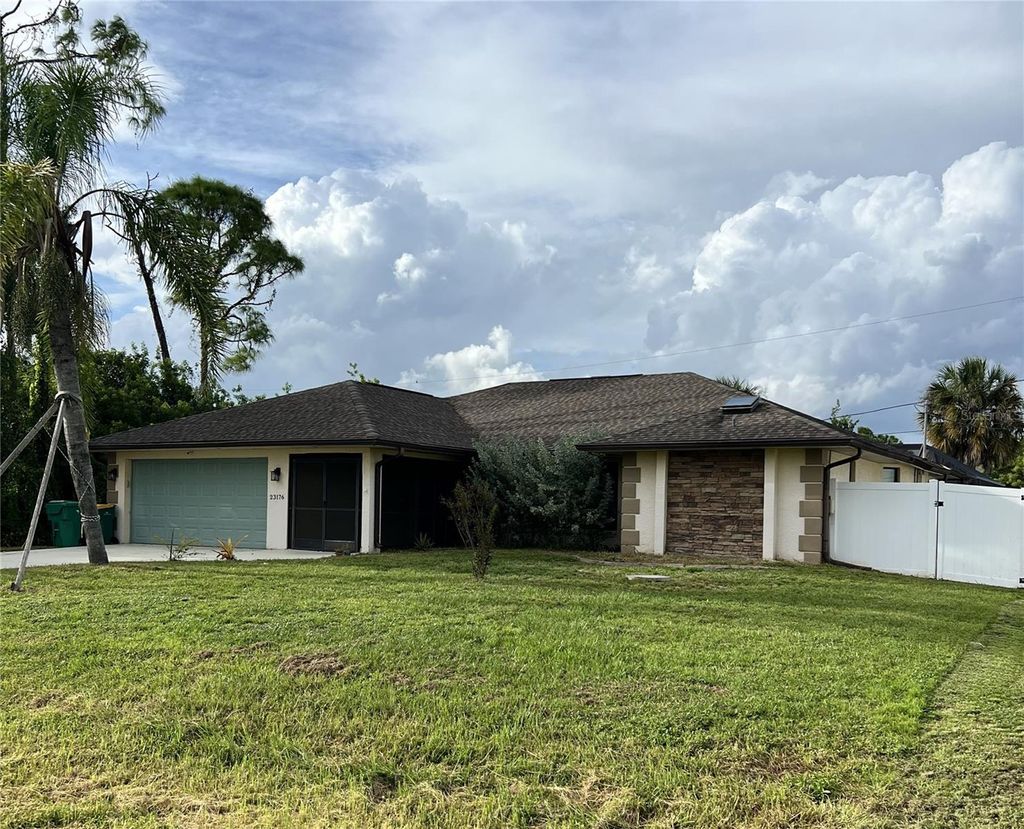 Photo of 23176 Aberdeen Avenue, Port Charlotte, FL 33952 (MLS # D6144096)