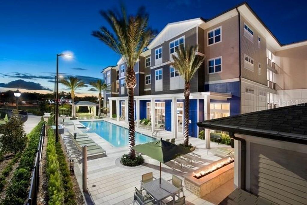 Photo of 3160 Integra Lakes Lane #A3, Casselberry, FL 32707 (MLS # O6347395)