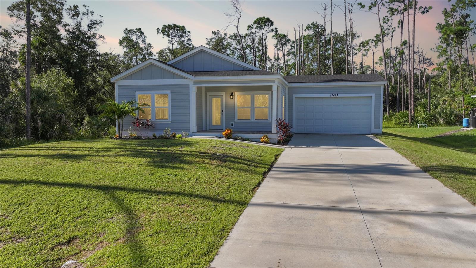 For limited time get 4.99% financing with preferred lender. This home has 3 bedrooms plus a den. As you enter this gorgeous home you will immediately see the beautiful upgrades. The kitchen is a chefs dream with white cabinets, quartz countertops, kitchen island and all stainless steel appliances. You can cook in your kitchen while entertaining guests as it overlooks a spacious Great room and nice size Dining room. This home also features luxury vinyl flooring throuhout the home which makes for easy clean up. The large primary bedroom has a lovely En Suite with dual sinks, gorgeous walk in shower, separate water closet and his & Her closets. The guest bedrooms are also very spacious and not far from the luxury guest bathroom. EXTRA BONUS...... NO FLOOD INSURANCE REQUIRED, HURRICANE IMPACT WINDOWS & DOORS. If the inside of this gorgeous home isn't enough to make you want to live here, then the location should as it is located between interstate 75 and route 41 for easy commuting. The new sunseekers resort is only 9 miles away and the famous island of Boca Grande is only 23 miles away. There is also shopping, Golf Courses, Restaurants, beaches near for that great Florida living. Don't delay make your appointment today. Also see the 3D tour and youtube video attached to this listing.