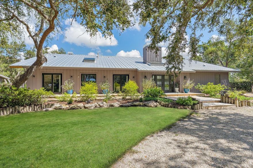 An exceptional private oasis that presents a notably rare and truly special opportunity. Thoughtfully updated throughout, this remarkable gem offers a splendid, unique residence where form & function blend to gift a comfortable luxuriousness. The 2,976 sq ft, 3 br/2 bath custom built main home & additional buildings encompass over 5,000 sq ft of excellence under air. A totally separate 1,920 sq ft building (2005 built/2021 reimagined) features versatile, flexible living/hobby/working areas that currently house: An inviting In-law/guest suite (1br/1bath), office/gym space, 3 garage bays for classic cars/etc., a sizable storage room and a dedicated safe room. The enchanting Key West style cabana (bathroom w/ heated outdoor shower) & pool/spa rejuvenated in 2021 w/ PebbleTec, new glass tile, equipment, heater = Sun Splashed Splendor!!! A massive (1,270 sq ft), yet cozy, covered Southern porch (new screening, framing) offers numerous seating options & dining served by pass-through windows. An 8X13 foot accordion impact glass door opens to stylishly unify the interior & exterior. This spectacular artisan designed estate delivers a resort level of serenity, comfort & superlative style. A gated/fenced 5 acres (zoned open use) of manicured grounds rich w/ oaks, azaleas & delightful staghorn ferns within easy proximity to the Gulf’s pristine beaches, recreational waterways & the nationally renowned Pine View School. A stand alone, oversized 3-bay detached garage has roomy, cooled workshop & storage areas. Be it a multi-generational estate, home-based businesses, or any number of life affirming hobby considerations: horses, vehicles, fitness, art, etc., your goals & aspirations will surely thrive here. This zen-like masterpiece invites you & yours to personally embody "The Art of Living Well”. Expertly constructed improvements & respectful renovations have sculpted a “second to none” modern showpiece w/ two distinctly beautiful fireplaces. Superb planning = sensational results, replete with purpose & beauty. Your senses will absolutely feast on the main home's dream-like gourmet chef kitchen w/ WOW factors galore, all under hand troweled 10 ft ceilings: Substantial Liehberr Monolith Fridge, Freezer & Wine Cooler, Monogram 48" professional gas range, hand-crafted hood, double wall convection oven, elegant quartz counters (Cambria Luxury Series), apron farm sink, built-in coffee/wine bar & a vast walk-in pantry. A gorgeous primary bath w/ porcelain/marble & a state of the art, blissful steam spa shower will please greatly. Extensive additional improvements include PGT impact windows, impact doors & far more. New (8/23) metal roof on main home/4 new skylights, plus a whole house propane generator = peace of mind. New (7/23) screws on 2 largest other metal roofs. All 5 living space a/c units 2021 young, w/ 2 zones in main home. Recently fenced w/ a combo of metal/vinyl w/ new mechanical metal gate. Designed & crafted w/ passion & pride at original build, this two-owner beauty is currently unrivaled and primed to gift you the exquisite chance to claim this extraordinary legacy. Needs, wants & DESIRES, all gloriously checked here. Easiest of access to Rt 41 & 75, the new Sarasota Memorial-Venice hospital as well as the multitude of pleasures that define Sarasota County coastal living. Act today to secure this ONE OF A KIND, must see/must do treasure.