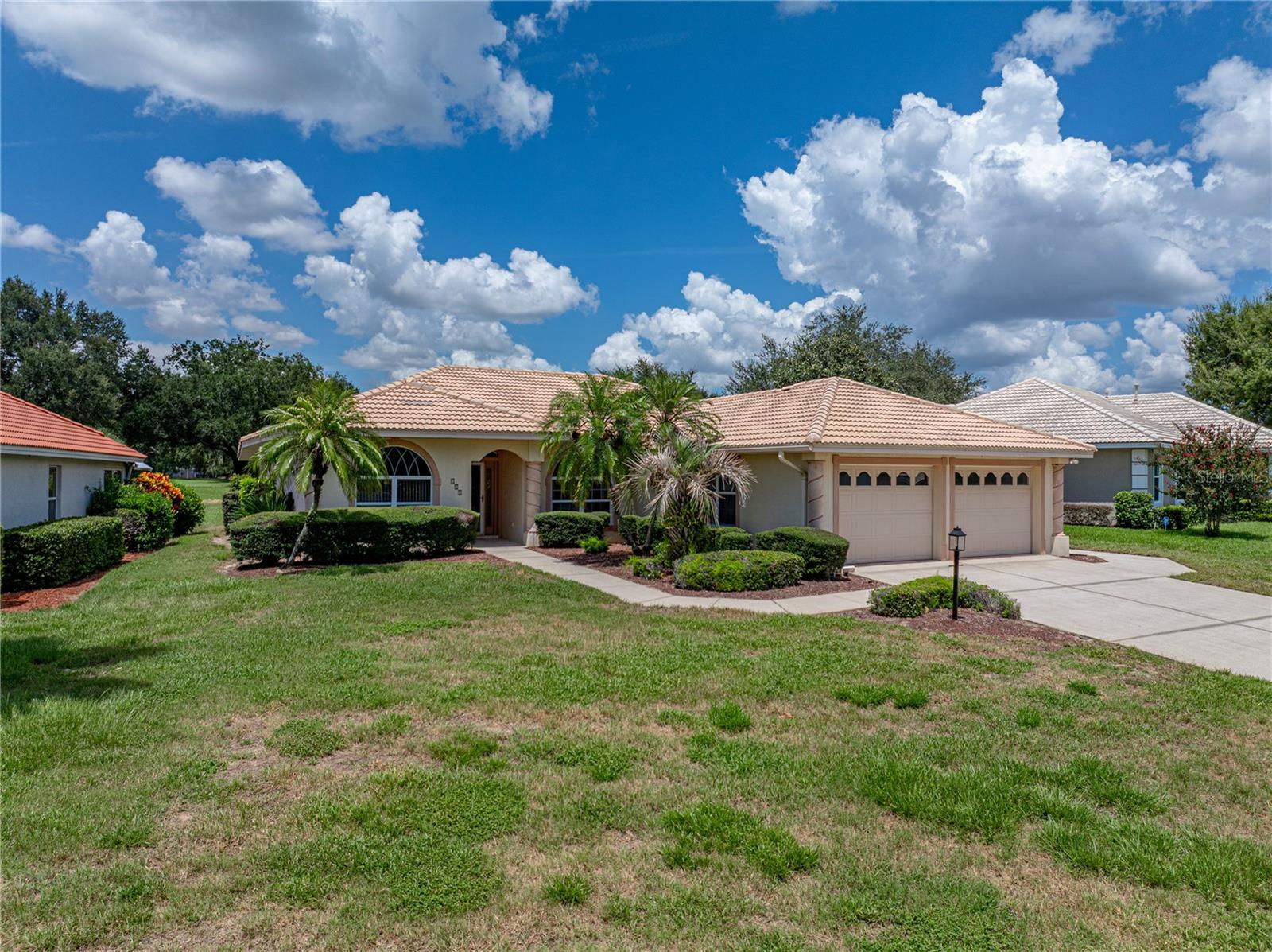 Golfer’s Paradise in Gated Lake Bess Country Club!
Nestled in a desireable golf course community, this beautifully crafted 3-bedroom, 2-bathroom home offers the perfect blend of comfort, elegance, and leisure. Designed with a split bedroom plan, it’s ideal for entertaining while offering privacy for guests.
Step inside to discover vaulted ceilings in the spacious living room and exquisite woodwork throughout, including custom columns, crown molding, and decorative window trim and beautiful windows. You will love the flow of the open living area with formal dining,a spacious living room and an everyday eating area off the kitchen. The 12x25 Florida room features tile flooring and panoramic views of the pristine course—perfect for morning coffee or relaxing after a round.
The primary suite is a true retreat with a dramatic tray ceiling, walk-in closet, dual sinks, jetted tub, and a separate walk-in shower. Additional highlights include an inside laundry room and an oversized 2-car garage with a convenient side door for your golf cart.
Lake Bess Country Club homeowners enjoy unlimited golf, a driving range, putting green, a screened community pool, clubhouse, and lawn maintenance—all included. Located just minutes from shopping, dining, and medical facilities, this home is the ultimate in golf course living!