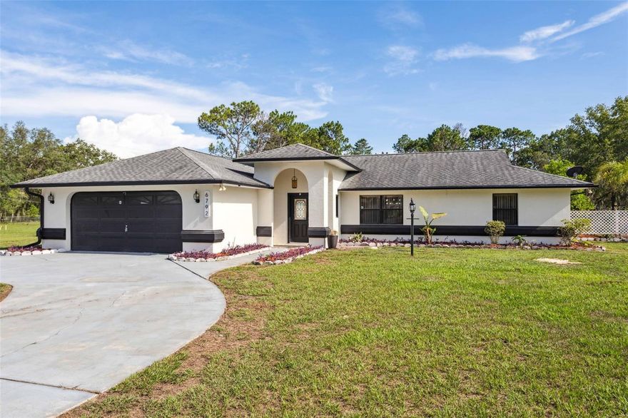 submit your offer today!  Beautiful and remodeled home situated on a 2.03-acre lot in a quiet neighborhood just a couple of miles east of US19. This property offers a range of features and upgrades, making it move-in ready for the new owners. The interior of the house boasts remodeled cabinets, new quartz countertops, and new appliances in the kitchen. The bathrooms have also been updated, and the home features sliding barn doors, adding a touch of style. The open floor plan creates a spacious and inviting atmosphere. Outside, you'll find a large open rear patio where you can enjoy the outdoors and privacy. Additionally, the property offers RV parking and hookup, allowing your family or guests with RVs to visit comfortably. The 2.03-acre lot is completely cleared and well-maintained, providing a beautiful yard. You can enjoy the tranquility of the countryside while still having convenient access to modern amenities. Nearby, you'll find stores like Walmart, Publix, Dunkin Donuts, as well as the Suncoast Parkway and Tampa International Airport, which are less than an hour away. The location also offers various attractions and recreational opportunities. Sugarmill Country Club with its 18-hole golf course and restaurant, Homosassa River, 7 Sisters Springs, Chassahowitzka River, and several waterfront destinations like The Freezer Tiki Bar and Monkey Bar at Florida Cracker Riverside Resort are all within reach. State parks and wildlife management areas are also nearby, providing ample opportunities for outdoor activities. The house itself has been freshly painted both inside and outside. The master suite features a private on-suite bathroom with double sinks, a spacious shower, and a large walk-in closet. The exterior features new brick pavers, and a sizable yard, perfect for parking your boats, recreational vehicles, and other toys. The property is great for hosting large gatherings and family barbecues. This home offers a fantastic opportunity to enjoy the best of country living with the convenience of nearby amenities and attractions. If you're interested, you can make an appointment for a tour to see the newly renovated home. Please note that the information provided is subject to change without notice, and the property is sold "as is" with no expressed or implied warranties.