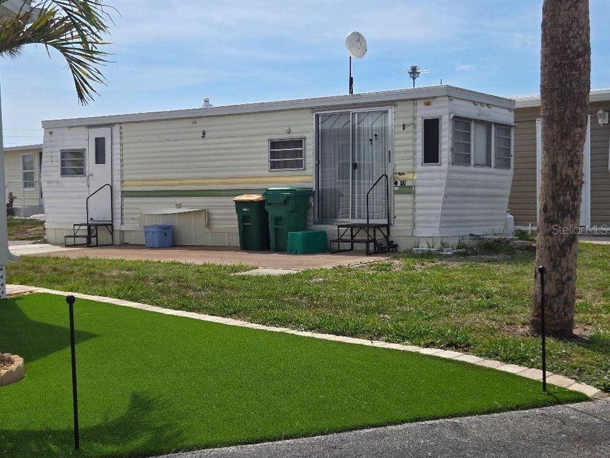 This small mobile home is on a nice lot across from the pool.  This park is like living in a resort setting. The low condo fees ($140) monthly covers lawn Maintenace, water and sewer, very active club house, Bocci Ball, shuffleboard, laundry rooms, public rest facilities and much, much more.  Located close to Manasota Key and the Beautiful Sand Beaches.  There are many stores, shops, restaurants, medical facilities, golf courses, marinas and great fishing spots close by.