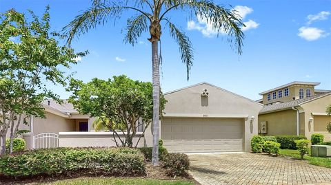 Photo of 2433 Kensington Greens Drive, Sun City Center, FL 33573 (MLS # TB8418737)