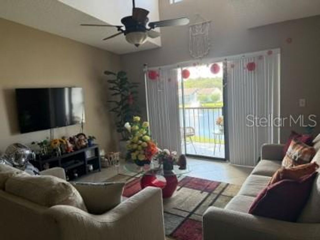 Photo of 8215 Sun Spring Circle #73, Orlando, FL 32825 (MLS # S5137969)