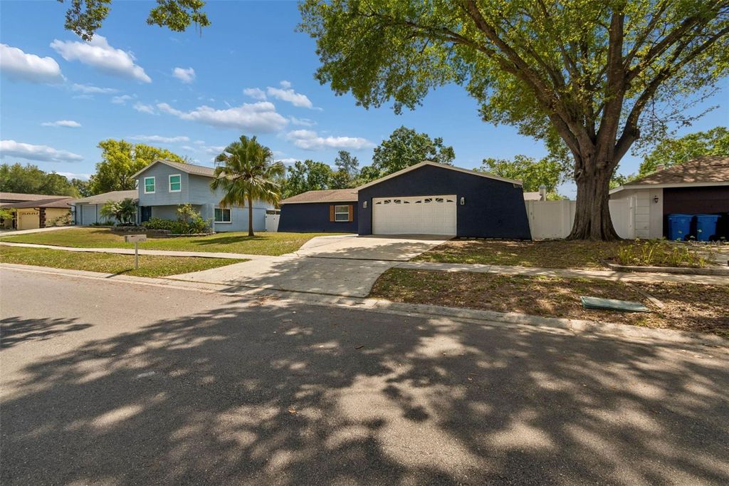 Photo of 4710 Southbreeze Drive, Tampa, FL 33624 (MLS # TB8491673)
