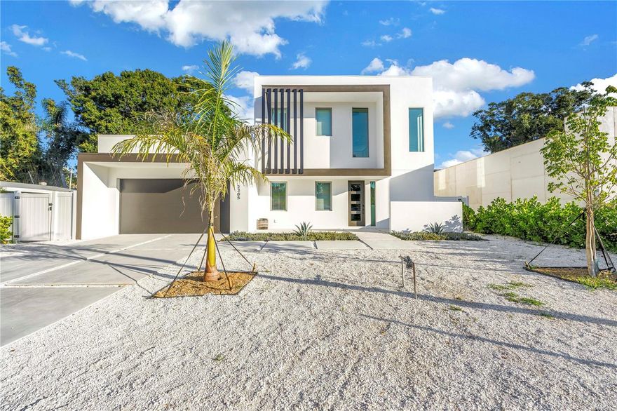 Tucked away on Temple Street, this stunning Sarasota home delivers the perfect mix of luxury, style, and comfort. With 5 bedrooms, 5 full baths, and 2 half baths (including a dedicated pool bath), every detail was designed for effortless living and entertaining.
Inside, bold black accents, designer lighting, and custom finishes set a sophisticated modern tone. The open layout flows seamlessly through the main living areas and a beautifully designed kitchen that’s as functional as it is striking.
Upstairs, a dedicated entertainment area with space for games and lounging offers the perfect hangout for family and guests. Step outside to your own private retreat featuring a heated pool and spa, outdoor shower, and a fully equipped outdoor kitchen ideal for dining and entertaining. Multiple balconies and shaded seating areas complete this exceptional property.
This home captures everything that defines modern Sarasota living—luxurious, inviting, and designed for unforgettable moments.