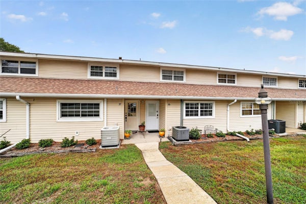 11001 SE SUNSET HARBOR RD APT E36, SUMMERFIELD, FL 34491 - Image f516a9988b32bf0d288f96e3c0bc545a/248748136