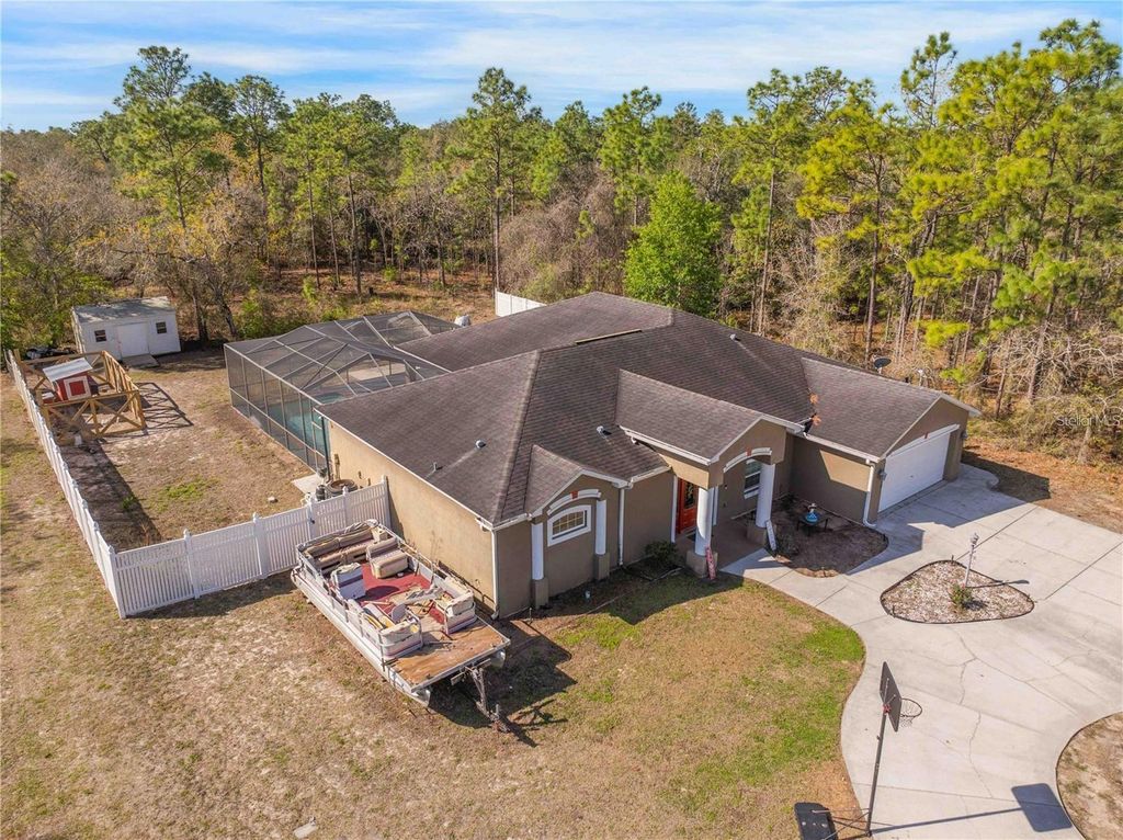 Photo of 13040 Quigley Avenue, Weeki Wachee, FL 34614 (MLS # TB8505140)