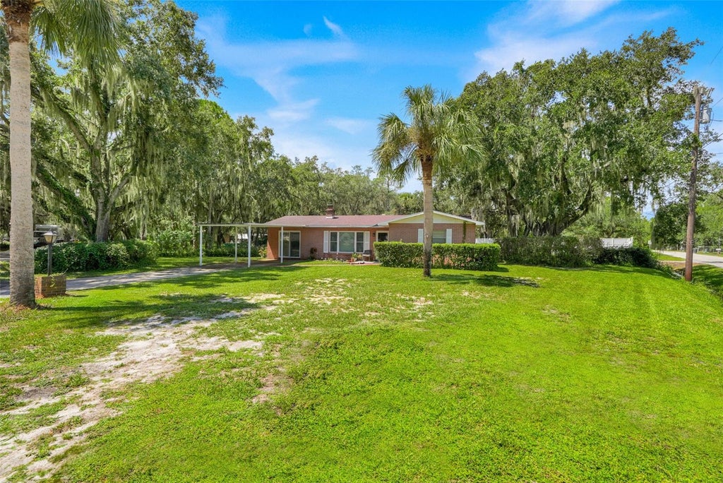 Photo of 11031 W Beach Parkway, Lake Wales, FL 33898 (MLS # O6438271)