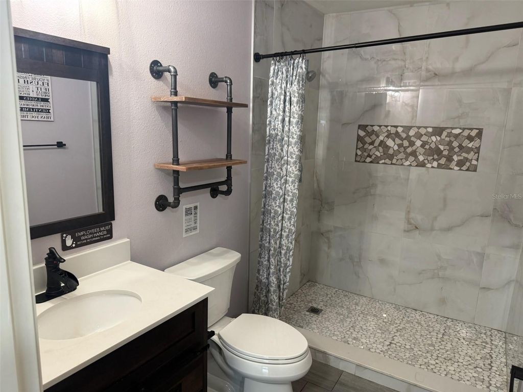 Photo of 18312 Holister Rd, Orlando, FL 32820 (MLS # O6404972)