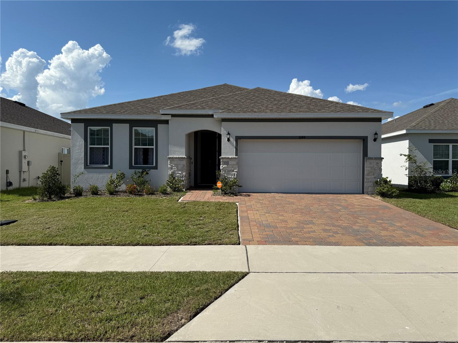 Brand-new in Hammock Reserve, this contemporary-luxury 4-bed, 2-bath home built in 2023 showcases an open-concept layout filled with natural light, gourmet kitchen with quartz countertops, and a spacious great room ideal for family living. The well-appointed primary suite features dual vanities and walk-in closet. Outside, a covered lanai extends living space to outdoor entertaining. Residents enjoy resort-style amenities including a clubhouse, fitness center, swimming pool, playground , and walking trails. Conveniently located near shopping, dining, top-rated schools, and major commuter routes, this energy-efficient home offers the perfect blend of comfort and community living.”