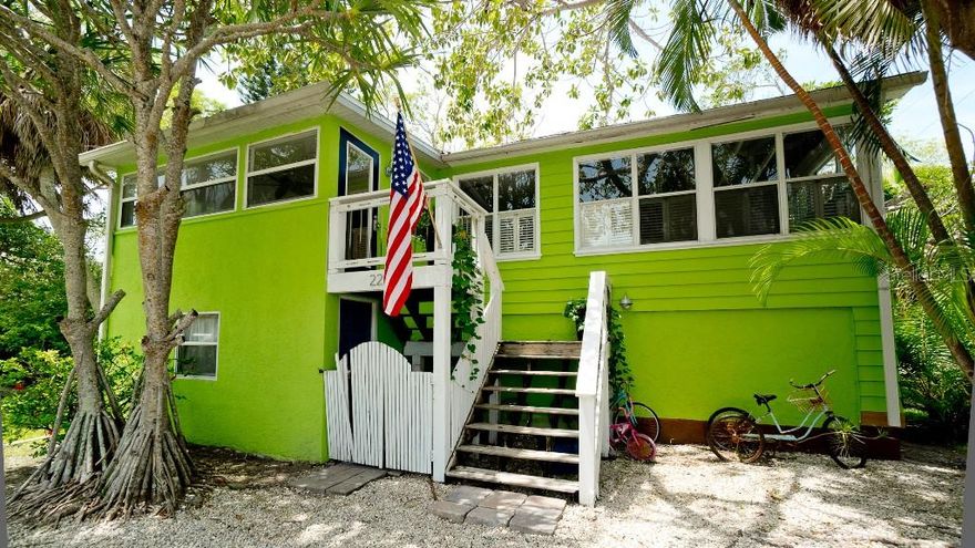 Investment Opportunity!  Only four houses from the beach.  House sits on two buildable deeded lots.  Rent or live in current house while building a second home. Great vacation rental location and excellent past reviews.  Spacious common areas filled with light and great for entertaining large groups. Updated kitchen, marble countertops, large butcherblock island. Two newly renovated baths with Carrara marble and rain showers.  Full roughed in owner's bath ready for your vision.  Glimpses of gulf and bay.  Six parking spaces with front and side yard parking also available.  RV parking and electric hook up.  Outdoor shower, large private bar, above ground pool, privacy fence and mature landscaping on both lots.   New roof and A/C unit in 2019.  Fully updated electrical and plumbing throughout.