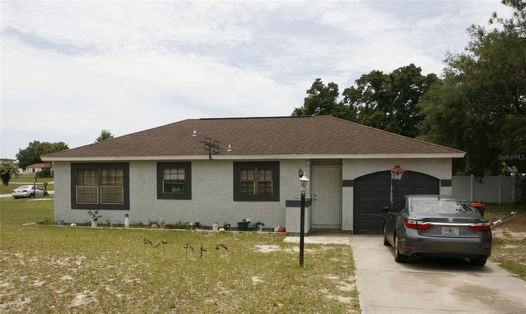Photo of 314 Oak Track Pass, Ocala, FL 34472 (MLS # OM726503)