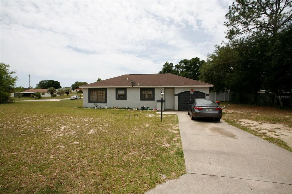 Photo of 314 Oak Track Pass, Ocala, FL 34472 (MLS # OM726503)