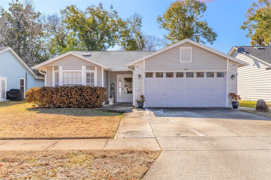 Tucked away on a quiet, storybook street in one of the area's most loved cities, this 3-bedroom, 2-bath home offers flexible, inviting living. The third bedroom is part of a smart garage conversion, ideal for a guest suite, home office, or hobby room, while the front of the garage remains fully operational with a true workshop and storage space. A spacious living room, dining, and kitchen create an easy flow, featuring a peekaboo window and an eat-in dining area off the kitchen. Soaring ceilings lead into the enclosed Florida room under A/C, perfect for relaxing or entertaining year-round. The primary suite includes a private ensuite bath and walk-in closet. Recent updates include a new roof in 2024 and new fencing in 2025, enclosing a fully fenced backyard with a side-yard shed & cozy fire-pit area. An inside laundry room with washer and dryer included adds convenience. Minutes to shopping, dining, parks, I-95, and top-rated schools.