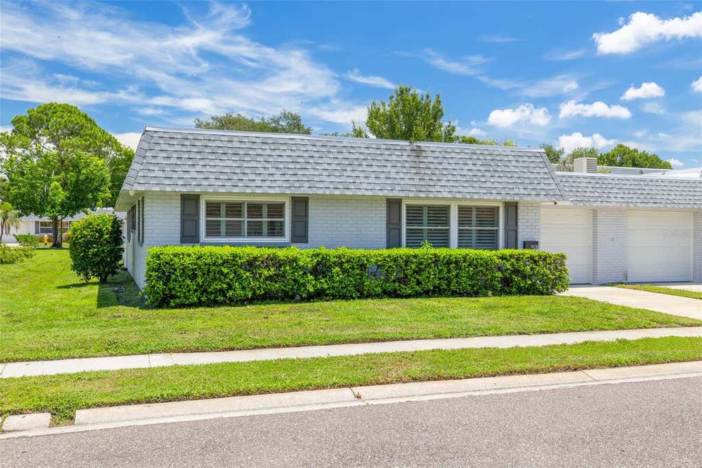 Photo of 908 Cara Drive #908, Largo, FL 33771 (MLS # TB8537297)