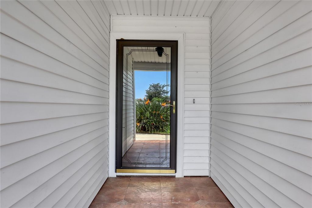 Photo of 778 Pine Shores Circle, New Smyrna Beach, FL 32168 (MLS # O6380013)