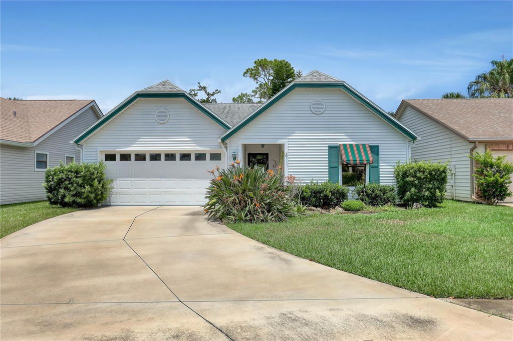 Photo of 778 Pine Shores Circle, New Smyrna Beach, FL 32168 (MLS # O6380013)