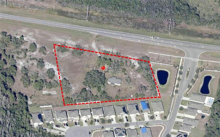 THIS PROPERTY HAS BEEN REZONED TO CCP ZONING WHICH ALLOW MULTIFAMIL AT 18 UNITS PER ACRE OR COMMERCIAL, PLUS OTHER USES. THE HOUSE ON THE PROPERTY IS BEING TORN DOWN AND HAS NO VALUE. ENGINEER EVALUATION WAS 46 UNITS COULD BE CONSTRUCTED ON THIS SITE.  IT IS 2.56 ACRES- HIGH & DRY NO WETLANDS. THE VACANT LAND TO WEST IS ALSO +/- 2.5 ACRES MOST LIKELY IS AVAILABLE. THIS PROPERTY NEAR THE NEW VISIONS DEVELOPMENT AND REUNION. WATER & SEWER CONNECTIONS ARE AT
SULLIVAN ROAD. PRICE WAS DEVELOPED TAKING IN TO ACCOUNTY THE COST TO RUN SERVICE TEO SITE.