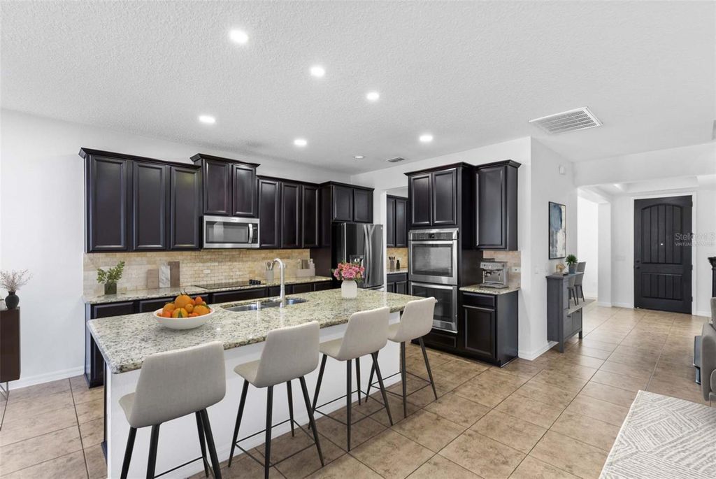 Photo of 14978 Fells Lane, Orlando, FL 32827 (MLS # O6401471)