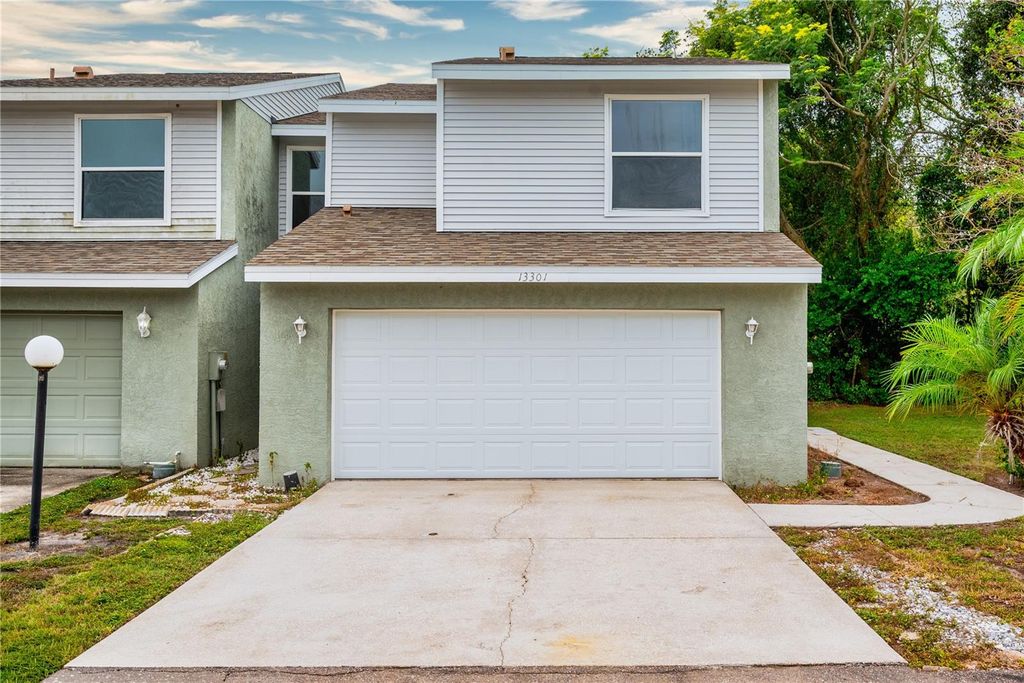 Photo of 13301 Arena Place, Tampa, FL 33612 (MLS # TB8439753)