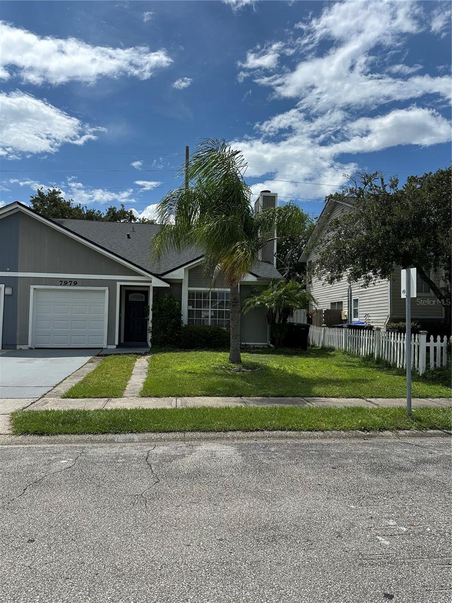 Come and see this lovely 3Br/2Ba unit with the primary bedroom and bathroom downstairs. Tile throughout in all the social areas and Primary bedroom, bathroom and walk-in closet. Charming upgraded kitchen with lots of light coming in through the sliding doors. High ceilings with ceiling fan in the living area as well as a fireplace. Second and third bedrooms are upstairs with a full bathroom. Great back yard with lots of space for grilling and entertaining. Don't wait, schedule your appointment now, this home won't last long!!