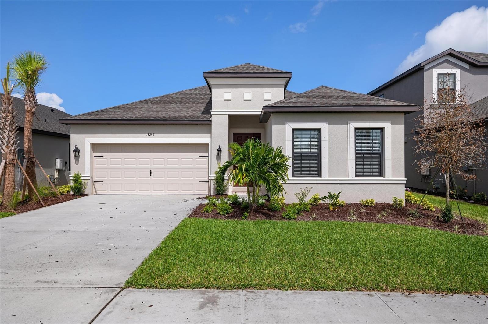 This 3 year old Antigua model is located in Palermo, a developing community in Nokomis by Taylor Morrison the perfect complement to the Florida lifestyle and less than a 10-minute drive to the local beach. The Antigua offers 2,400 sf of open concept living area with 4 bedrooms, 3 full bathrooms, and a separate den off the foyer. The home's main living area is open and bright, presenting the occupant with modern spaciousness. This home's kitchen upgrades include wood faced cabinets, stainless steel appliances, gas cook top, built-in microwave and oven, quartz countertops, touchless kitchen faucet by Moen, under-sink water filtration system. The master suite includes wide views of the small lake, private 5 fixture bath with garden tub, glass enclosed shower, private water closet, and large walk-in closet with access to the laundry room. Washer and Dryer provided by Owner. The home does include central gas, and a tankless gas water heater, gas cook top, and gas dryer, outdoor grill center, and screened rear porch.