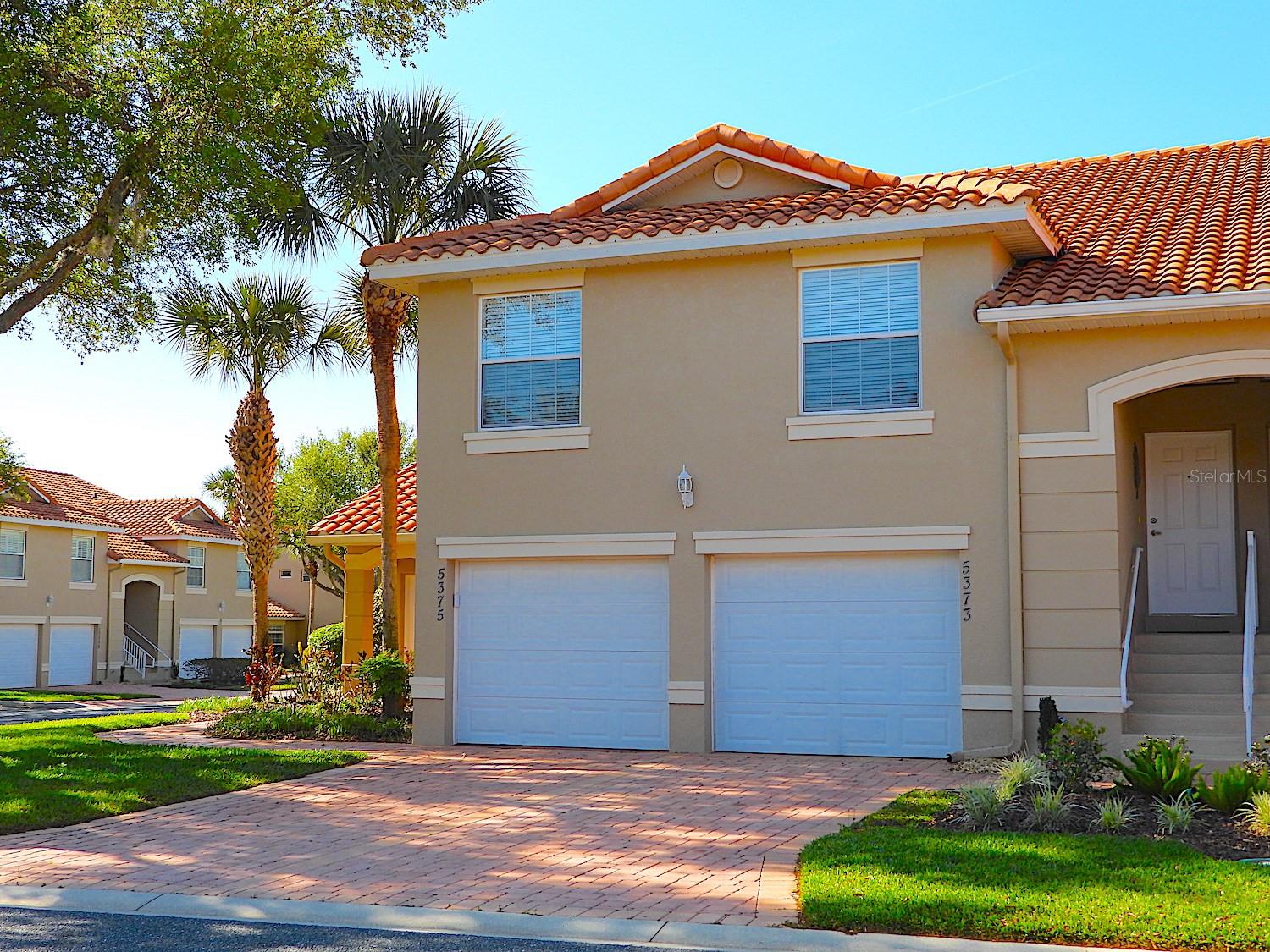 RESORT STYLE, Maintenance Free, Condo Living in a Gated Lakeside Landings adjacent to the Villages Fl! Easy access to Sumter Landing and Brownwood Squares, and 1 minute walk to our Clubhouse, Fitness Center, Billiard Room, Library, Banquet Hall, Card Room, Resort Pool with waterfalls, a Spa and Cabana plus a smaller pool with hot tub. Beautiful upgraded Home on First Floor. Lots of upgrades and features. The eat-in kitchen has brite cabinets with granite countertops and tile backsplash. The large master bedroom has a walk-in closet and private master bath with a double sink vanity. The screened porch overlooks a quiet courtyard access from the Living room. Interior laundry. New Fridge, A/C, Flooring, hot water heater, new toilet seats, Plantation shutters, Washer/Dryer, garbage disposal, Master B/R new Moen faucets. Lakeside Landings offers Resort style living featuring many amenities! Including a playground, fishing dock, putting green, pickle ball, and tennis Courts! Nowhere else can you live like this and enjoy a vacation-like lifestyle every day This Condo is amazing & waiting for you!
