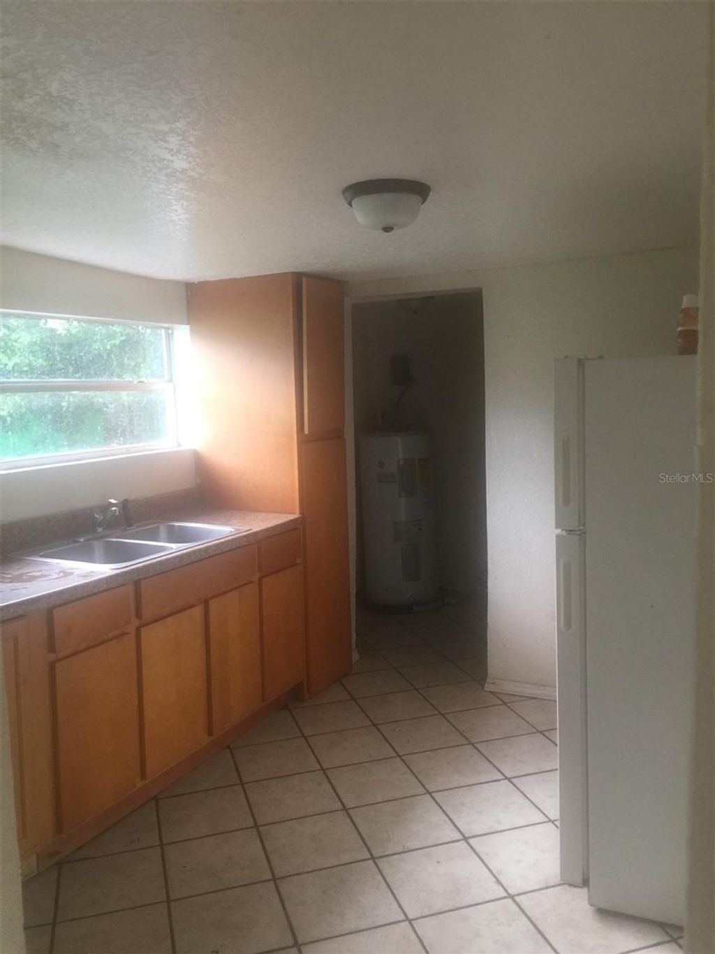 Photo of 641 W 6th Street, Lakeland, FL 33805 (MLS # O6363847)